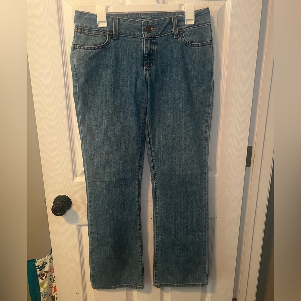 Women’s Wrangler Premium Patch Jeans with pink stitching Size 7/8x32